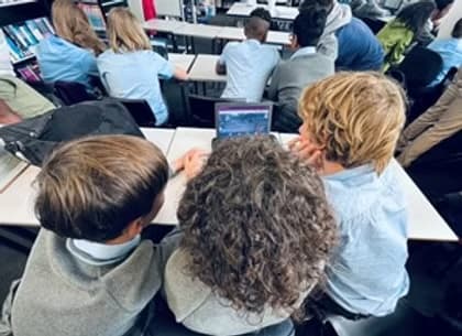 Kids on computer in school